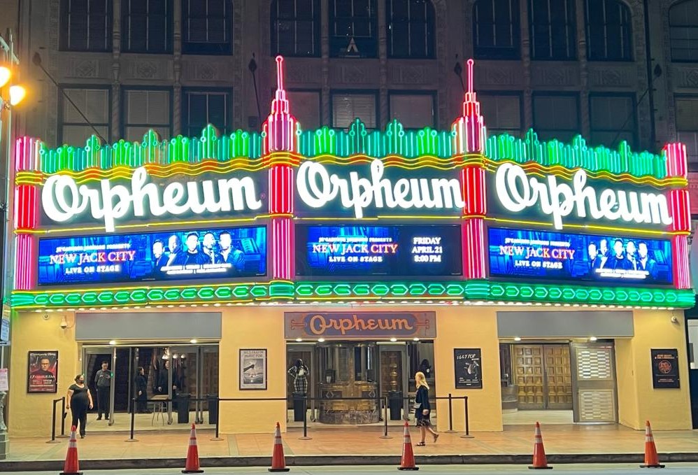 The restored historic Orpheum Theatre marquee illuminated at night